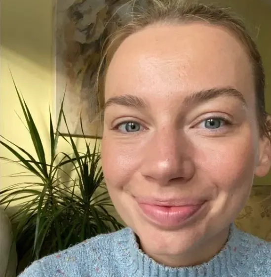 Lily smiling in her therapy space